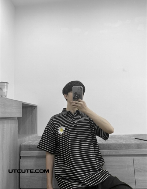 Polo sọc ngang thêu hoa cúc mean
